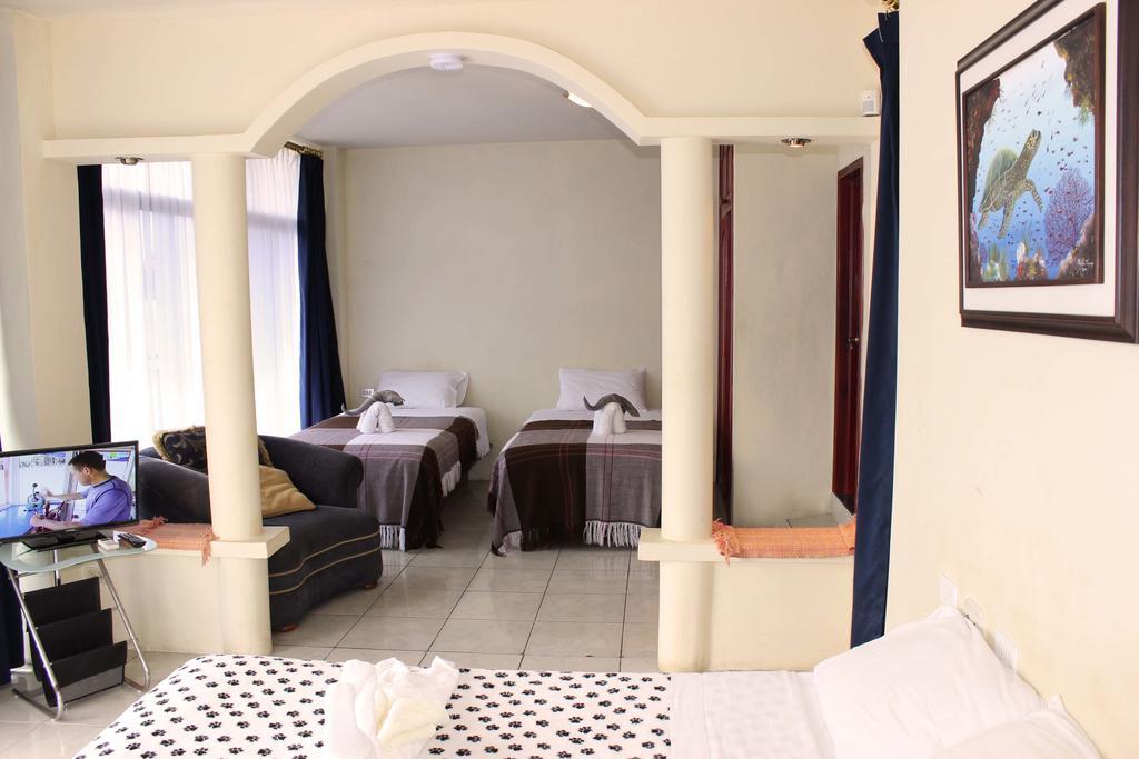 Planet House Hotel ปูแอร์โตอาโยรา ห้อง รูปภาพ