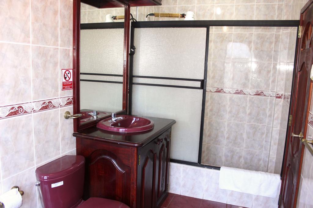 Planet House Hotel ปูแอร์โตอาโยรา ห้อง รูปภาพ