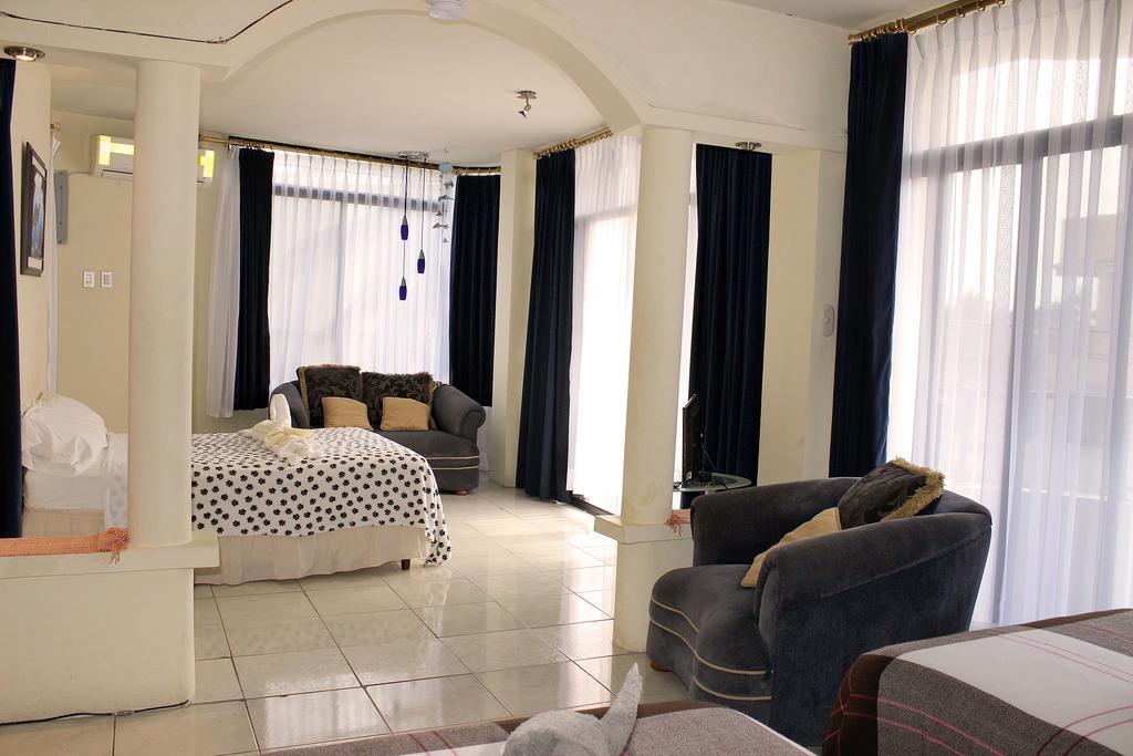 Planet House Hotel ปูแอร์โตอาโยรา ห้อง รูปภาพ