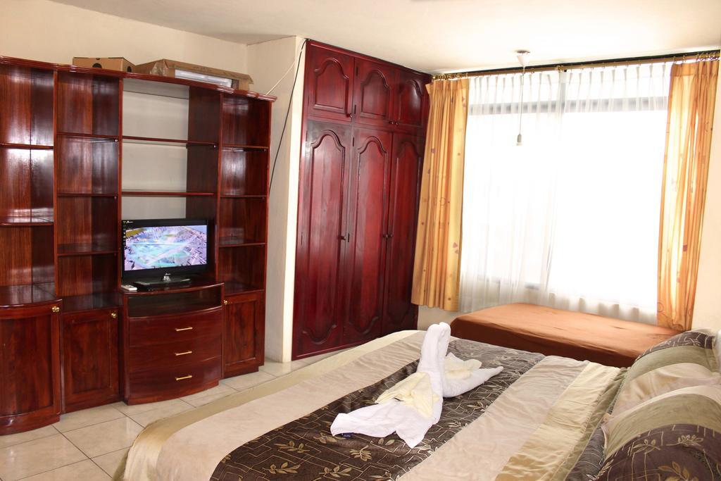 Planet House Hotel ปูแอร์โตอาโยรา ห้อง รูปภาพ